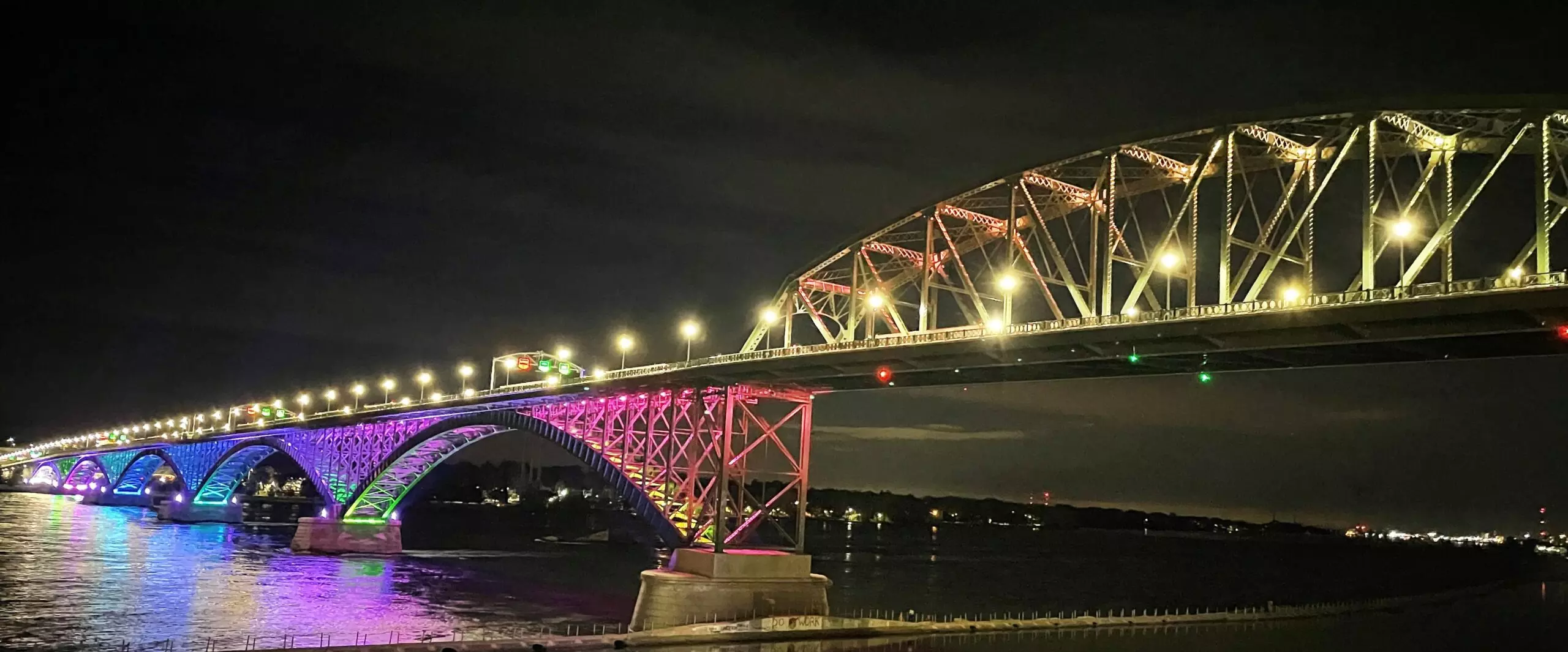 The Peace Bridge featuring a rainbow light